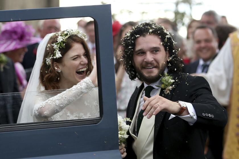 Actors Kit Harington and Rose Leslie depart after their wedding ceremony at Rayne Church, Kirkton of Rayne in Aberdeenshire, Scotland, on Saturday, June 23, 2018.