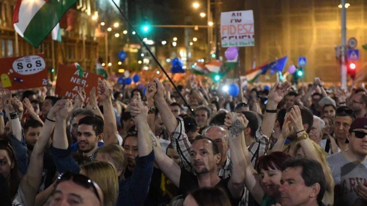 Tens of thousands of Hungarians take to the streets in Budapest on April 18, 2018, to protest against newly reelected Prime Minister Viktor Orban.