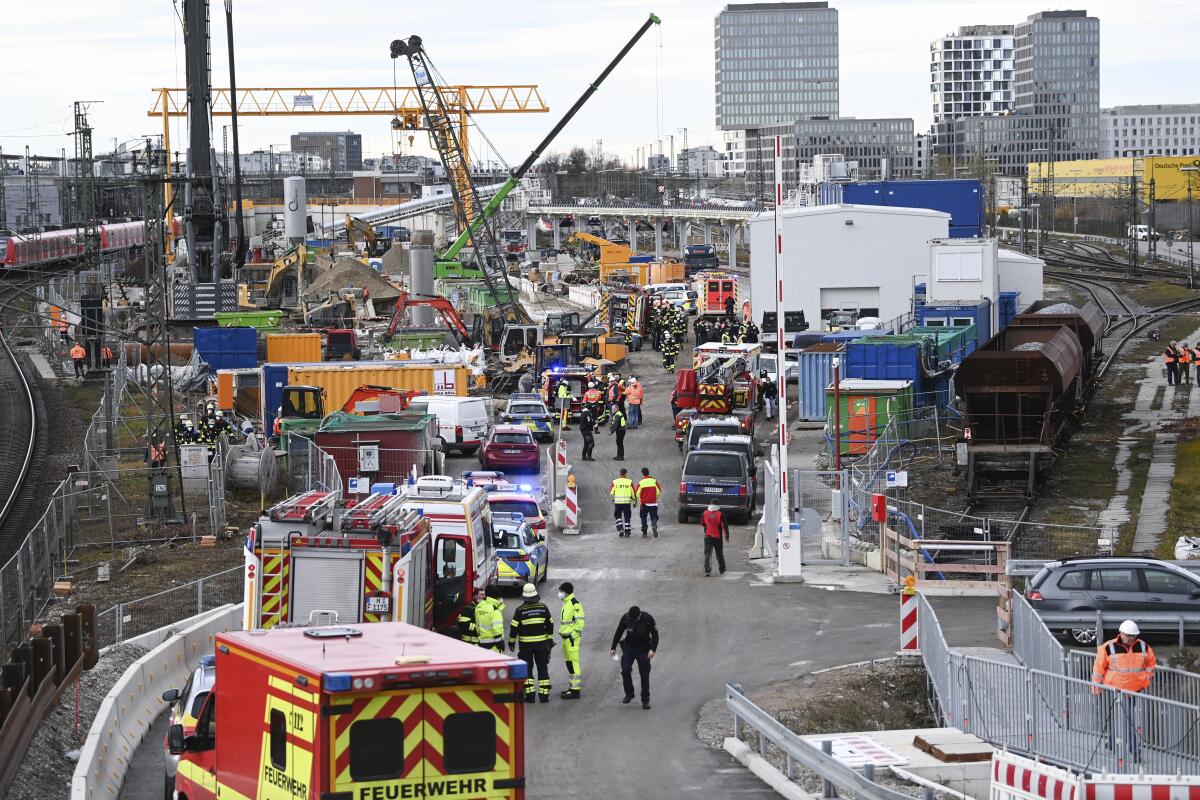 First responders at a railway site where a bomb exploded