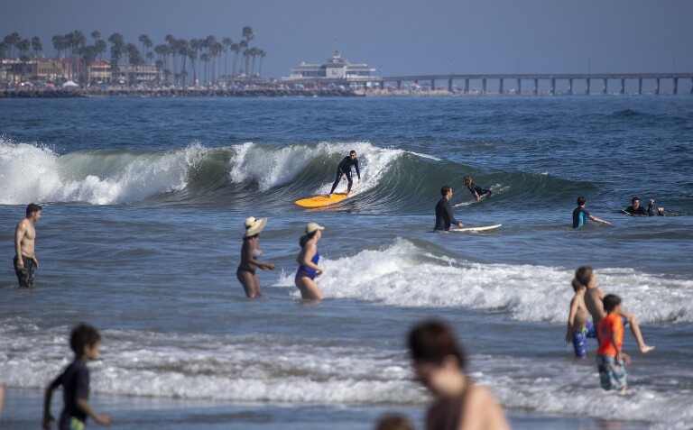 Newsom: State, local Orange County beaches must close temporarily - Los ...