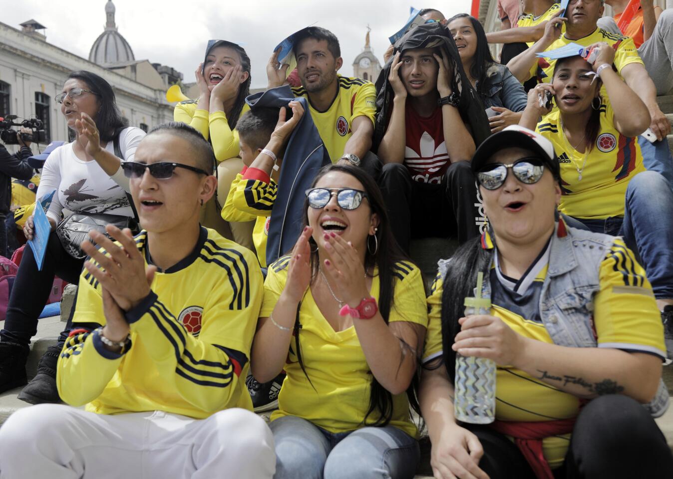 COLOMBIA-FBL-WC-2018-COL-POL-SUPPORTERS