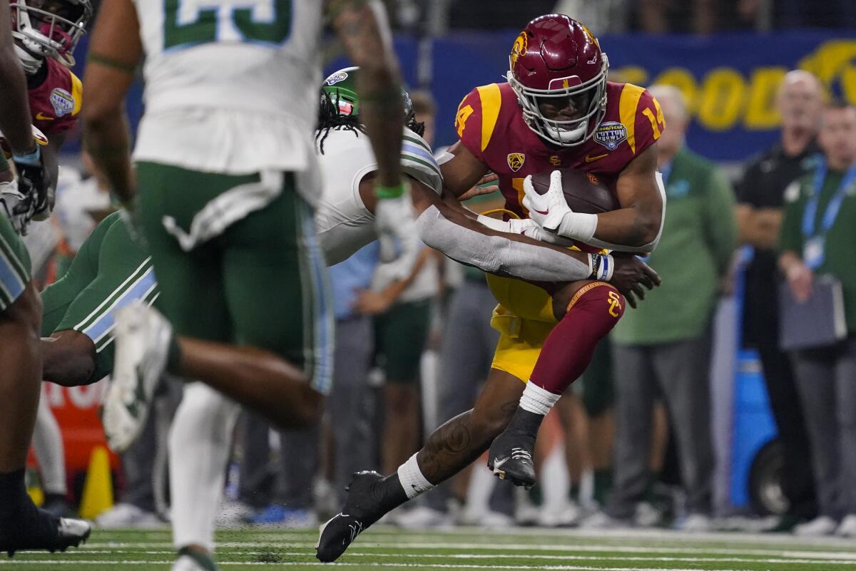 USC running back Raleek Brown carries the ball in the first half against Tulane.