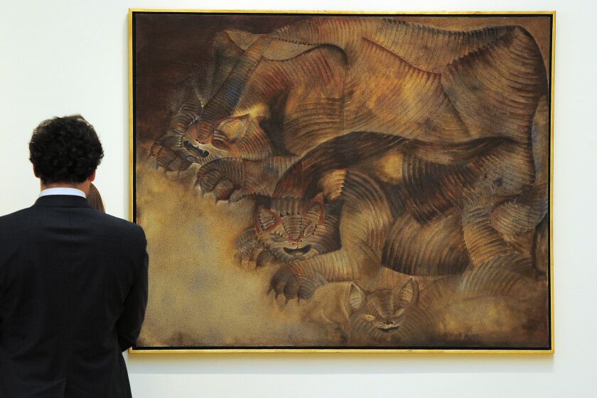"Gatos Con Pesadillas" by artist Francisco Toledo is on display during a press preview for Latin American Art sales at Sotheby's in New York, November 16, 2012. Sotheby's is scheduled to hold its Latin American art sales on November 19 and 20, 2012. AFP PHOTO/Emmanuel DUNAND - "MANDATORY MENTION OF THE ARTIST UPON PUBLICATION" (Photo credit should read EMMANUEL DUNAND/AFP/Getty Images)