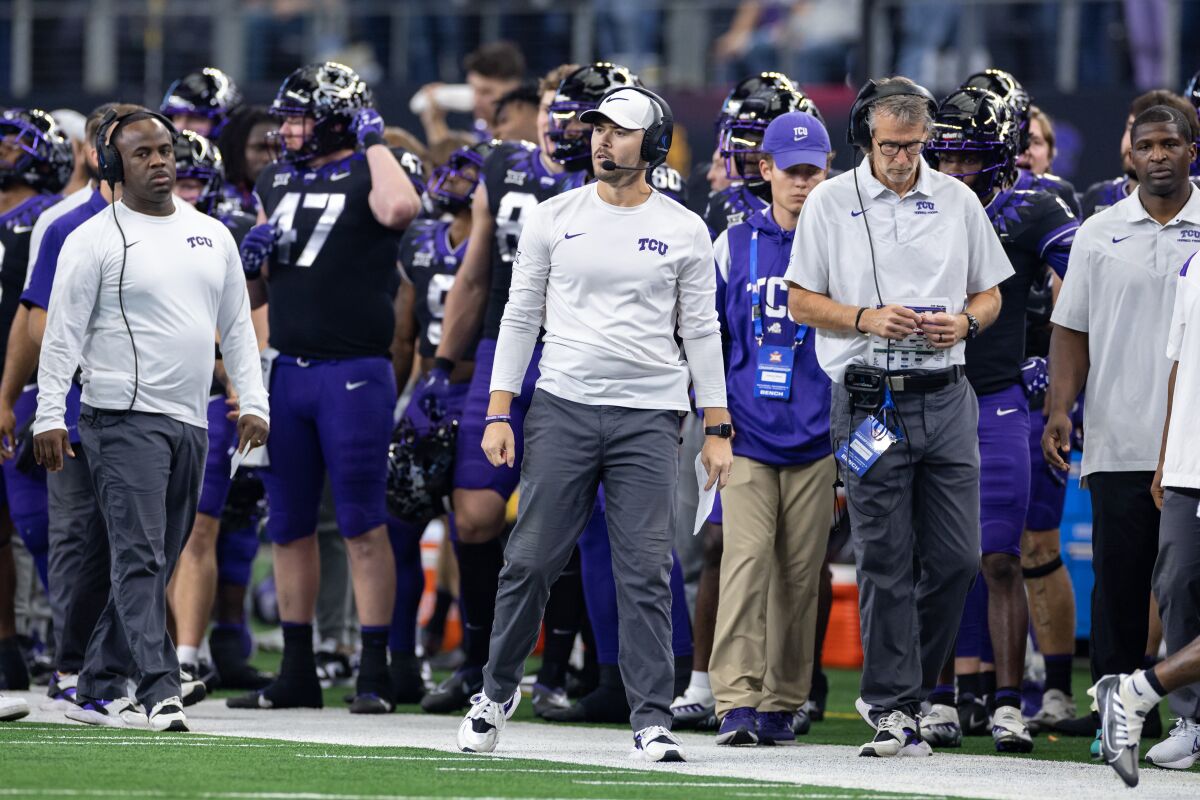 TCU offensive coordinator Garrett Riley watches from the sideline during the Big 12 Championship game.