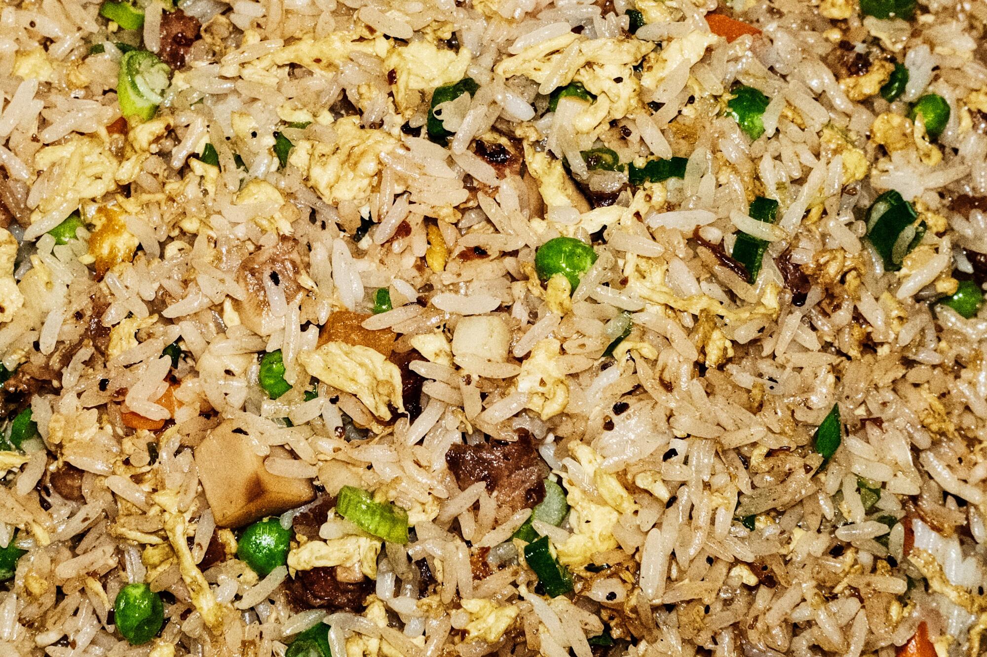 Fried rice is sprinkled with vegetables and egg in Array 36.