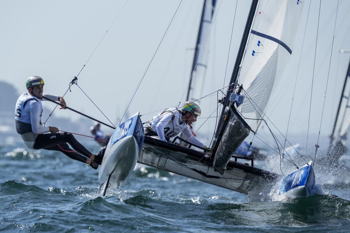 Australia's Jason Waterhouse and Lisa Darmanin compete during the Nacra 17 mixed race.