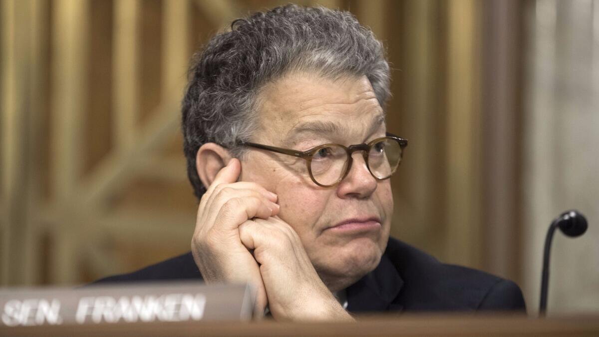 Sen. Al Franken listens during an Energy and Natural Resources Committee hearing on June 20, 2017.