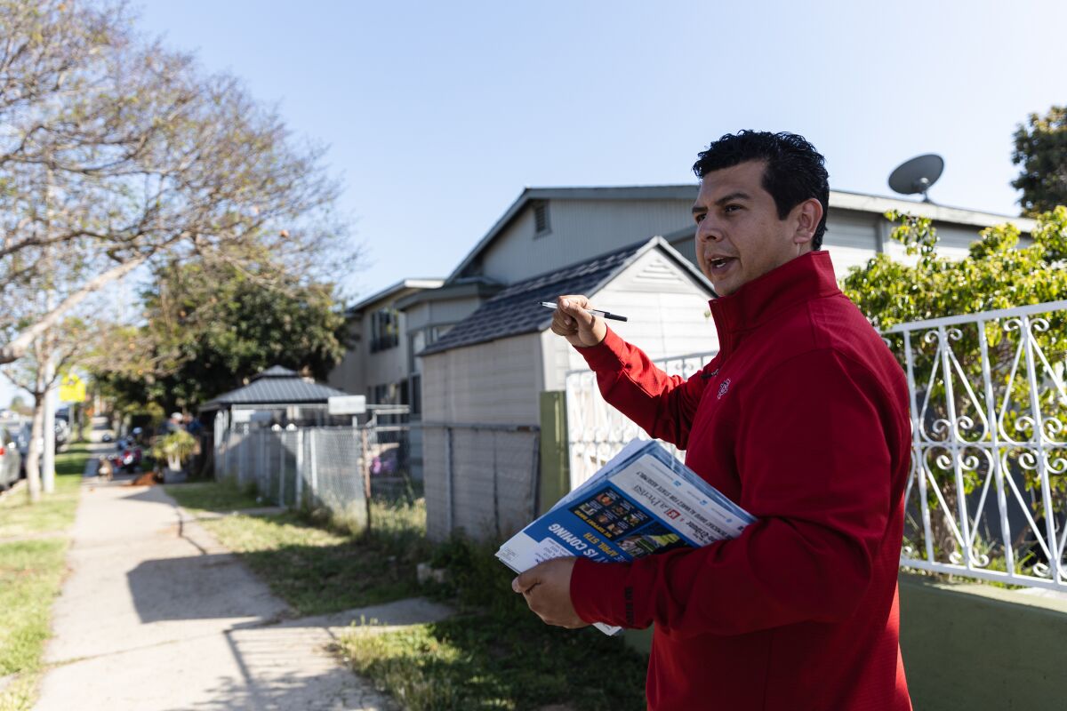 Candidate David Alvarez canvassing in the Barrio Logan neighborhood in an effort to get votes for the 80th Assembly District