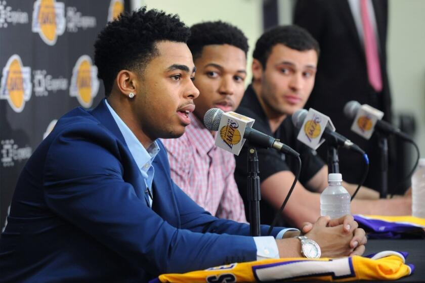 Laker draft picks, from left, D'Angelo Russell, Anthony Brown and Larry Nance Jr. answer questions during an introductory news conference in El Segundo on June 29.