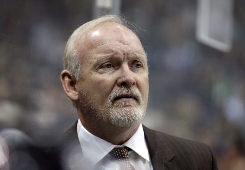 FILE - In this Jan. 14, 2017, file photo, then-Dallas Stars head coach Lindy Ruff watches play against the Minnesota Wild in the first period of an NHL hockey game in Dallas. Ruff is the head coach of the New Jersey Devils. (AP Photo/LM Otero, File)