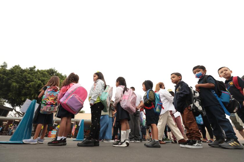 LOS ANGELES CA AUGUST 14, 2023 - Students line up before entering their classrooms at Weemes Elementary School in Los Angeles on Monday, Aug. 14, 2023. (Al Seib / For The Times)