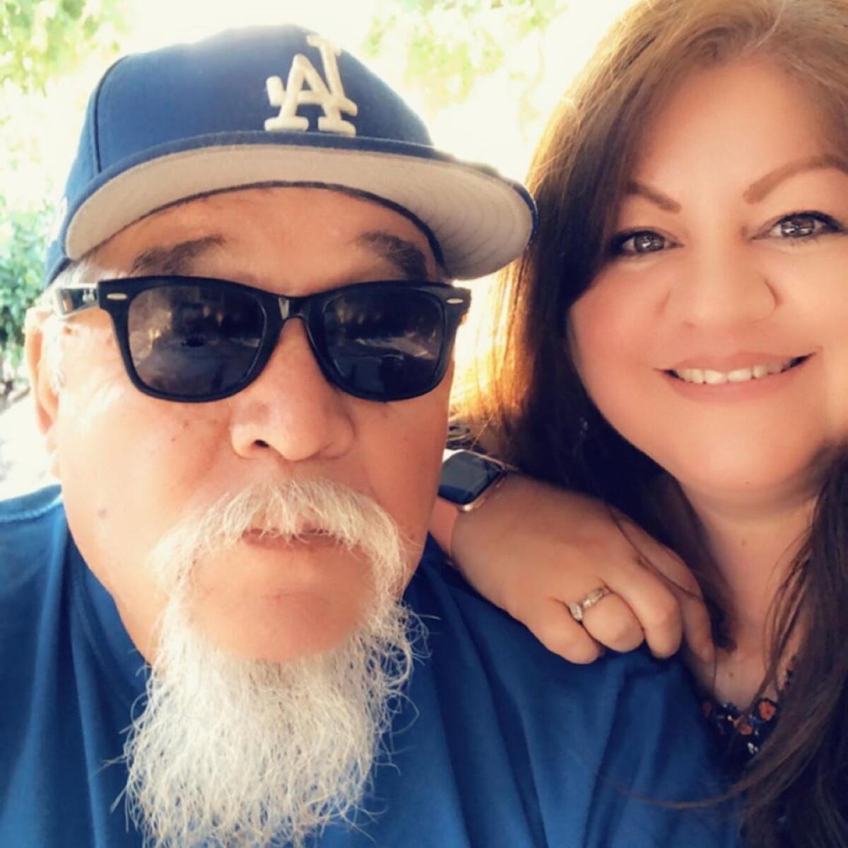Paul Martinez with daughter Inez Griego. She says her father once shared an elevator with broadcasting legend Vin Scully “but never got the nerve to talk to him”.