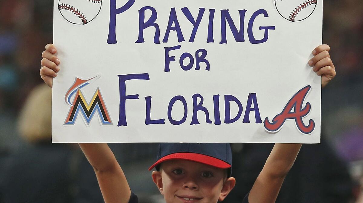 This young fan at the Braves-Marlins game Thursday night had the right idea. The person in charge of the playlist on the stadium sound system did not.