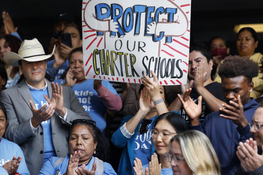 LOS ANGELES-CA-SEPTEMBER 19, 2023: Parents, educators and supporters gather for a rally outside of Los Angeles Unified School District Headquarters in downtown Los Angeles on Tuesday, September 19, 2023. The rally takes place during a meeting of the Board of Education, where a resolution put forward by Los Angeles Unified School District Board President Jackie Goldberg and Member Rocio Rivas, will be discussed, which could make more than 200 district campuses ineligible to share space with charter public schools, a practice employed by the LAUSD commonly known as co-location. (Christina House / Los Angeles Times)