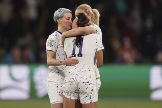 Megan Rapinoe and Lindsey Horan comfort Sophia Smith after they were eliminated from the World Cup