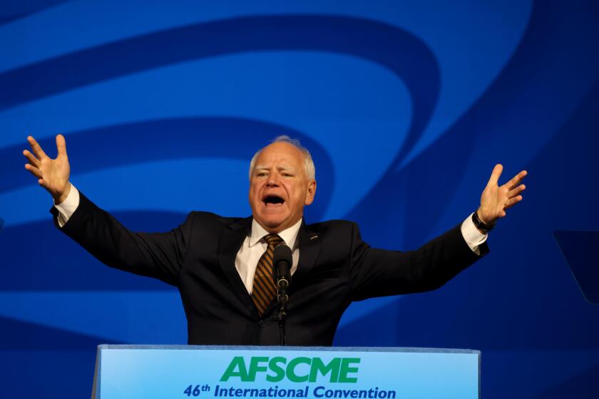 LOS ANGELES, CA - AUGUST 13, 2024 - Governor Tim Walz, vice presidential nominee, delivers remarks at the AFSCME's 46th International Convention in Los Angeles on August 13, 2024. Walz was joined by AFSCME President Lee Saunders and public service workers from all over the U.S. (Genaro Molina/Los Angeles Times)