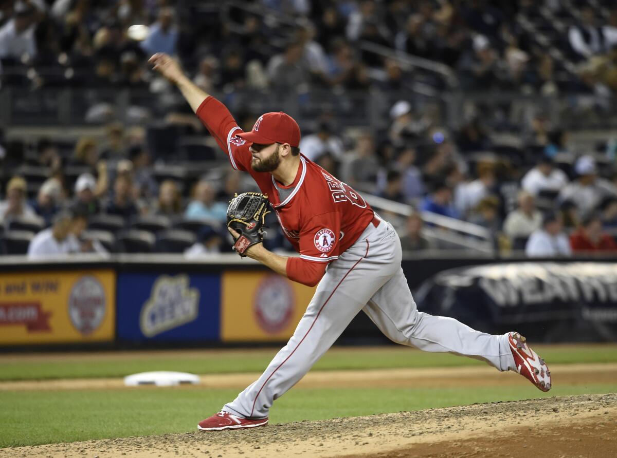 Angels relief pitcher Cam Bedrosian throws against the Yankees early this season at Yankee Stadium.