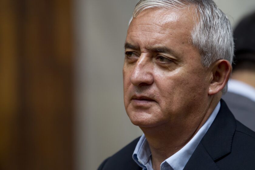 FILE - Jailed, former Guatemalan President Otto Perez Molina attends his pre-trial hearing for alleged corruption in Guatemala City, July 22, 2016. A Guatemalan court is expected to announce on Wednesday, Dec. 7, 2022 its ruling in a different case, for alleged fraud, by Perez Molina. (AP Photo/Moises Castillo, File)