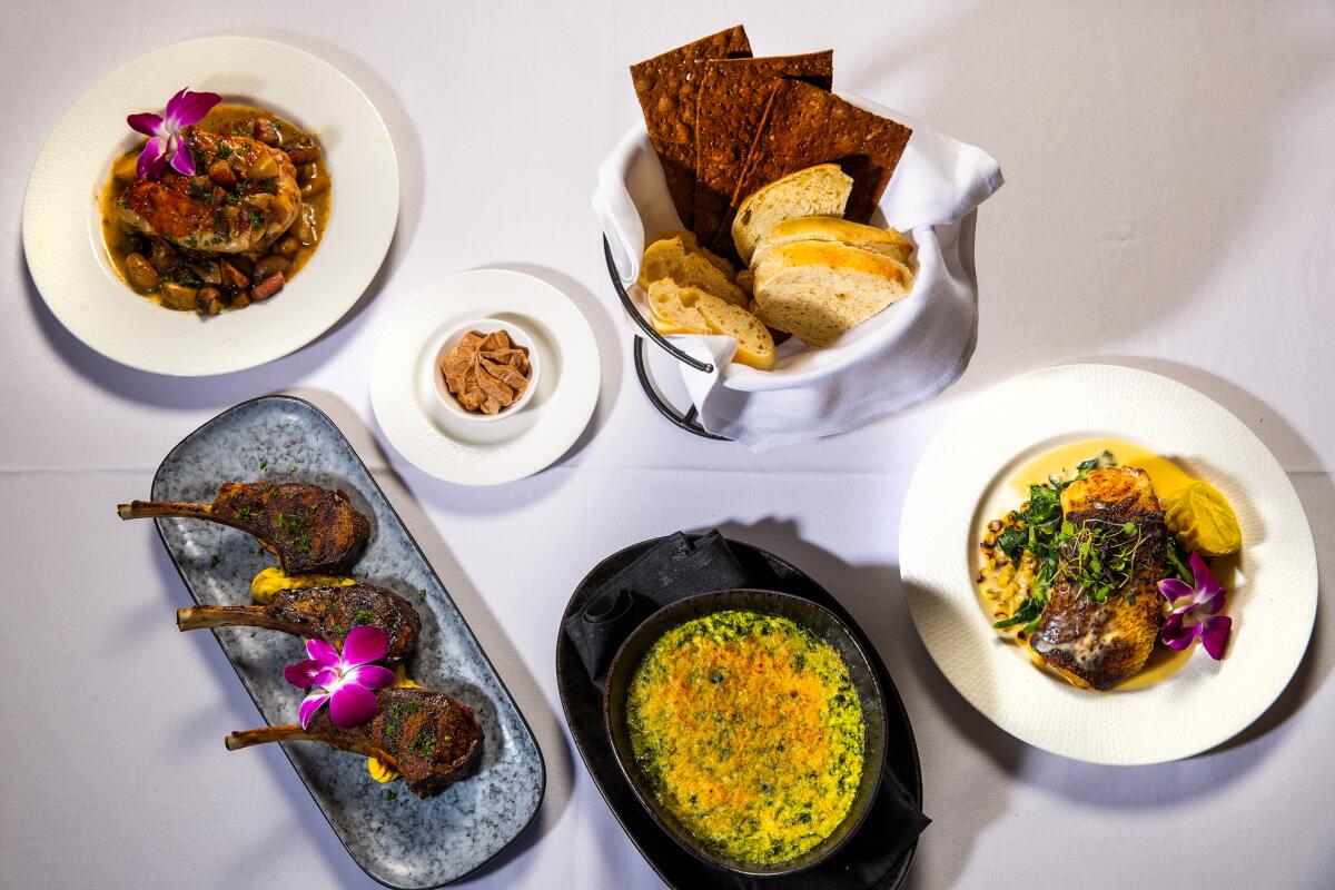 overhead view of several dishes of food at a steakhouse