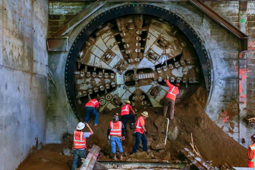 The tunnel-boring machine for the Crenshaw/LAX Line breaks through into the future site of the Leimert Park station in South Los Angeles in October. The 8.5-mile route will connect the Expo Line to the Green Line.