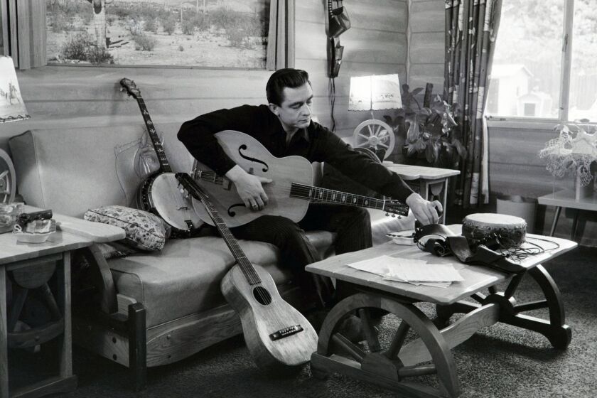 Johnny Cash at his home in California, 1960 from the PBS Ken Burns documentary, COUNTRY MUSIC . Credit: Sony Music Archives