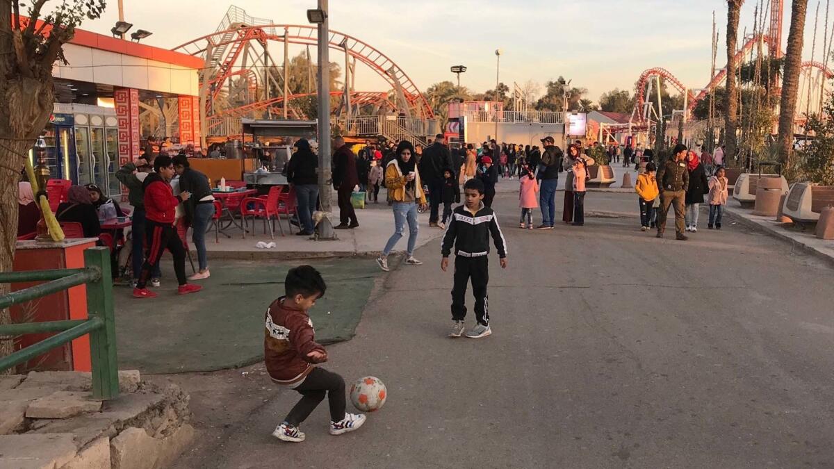 Children play at Baghdad's Zawraa Dream Land, an amusement park opened in 1971.