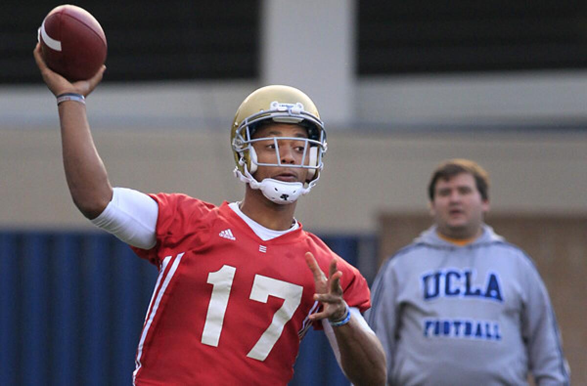 UCLA quarterback Brett Hundley, unloading a pass during a workout last spring, enters the 2014 season with great expectations after leading the Bruins to a 10-3 record in 2013.