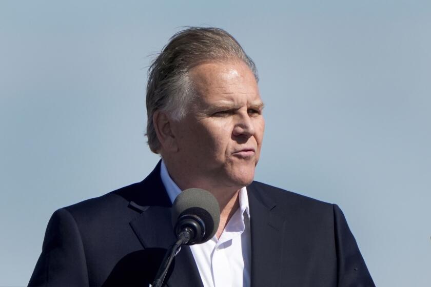 FILE - Former Rep. Mike Rogers, R-Mich., right, who is running for Senate, speaks at a Republican presidential candidate former President Donald Trump campaign event in Freeland, Mich., May 1, 2024. The top U.S. Senate candidates in Michigan cleared the final hurdle for the August primary ballot on Friday, with a state board confirming they submitted the required number of valid signatures. (AP Photo/Paul Sancya, file)