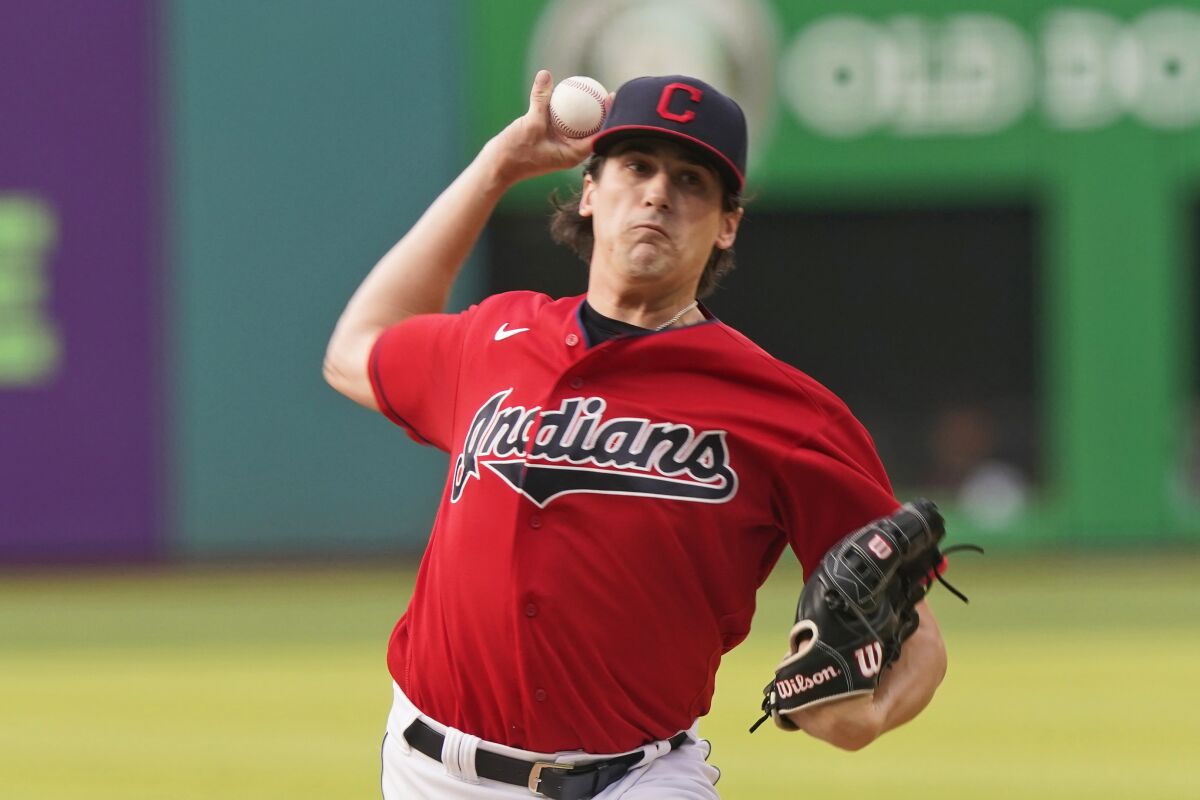 Cleveland Indians starting pitcher Cal Quantrill delivers in the first inning of a baseball game against the Detroit Tigers, Friday, Aug. 6, 2021, in Cleveland. (AP Photo/Tony Dejak)