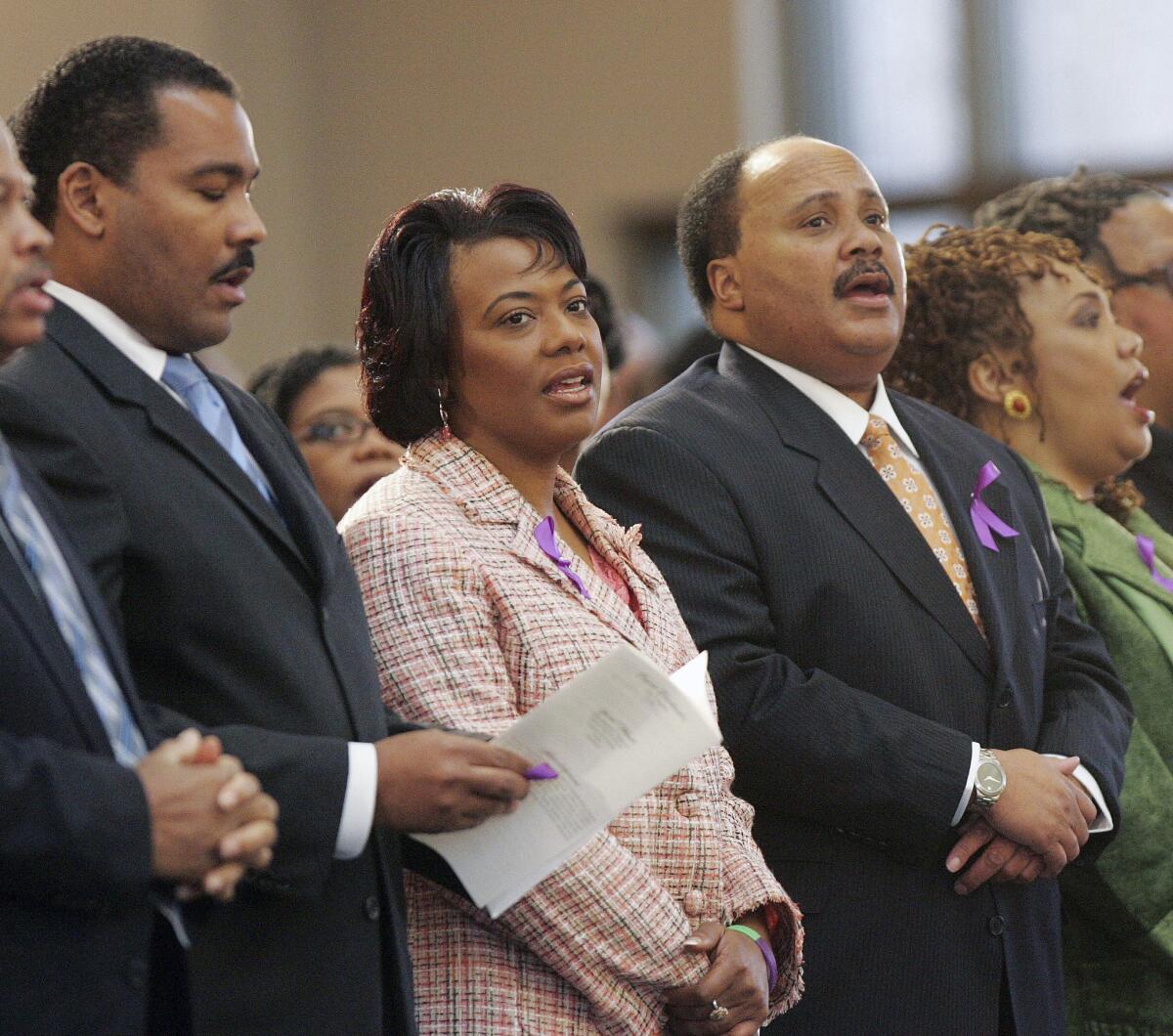 Dexter King, left, Bernice King and Martin Luther King III, shown at a 2006 tribute to their mother, Coretta Scott King, are now in a court dispute over the Bible and Nobel Peace Prize belonging to their father, Martin Luther King Jr.