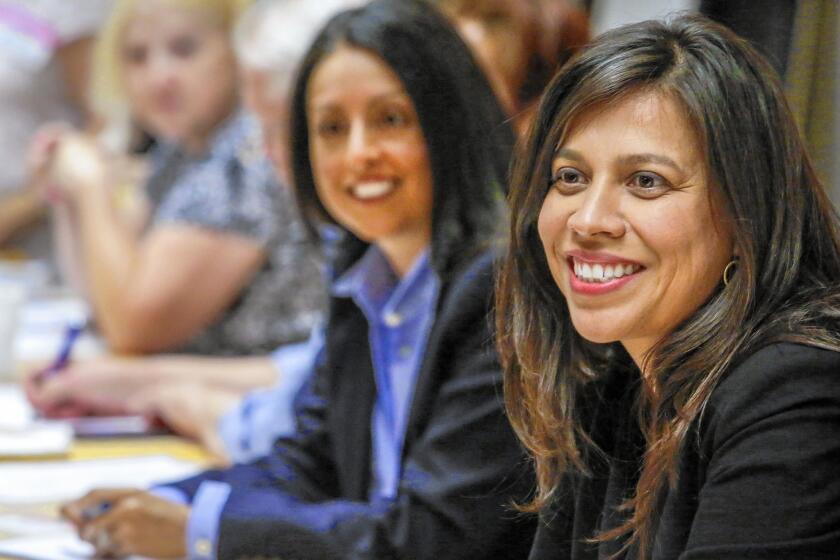 Cindy Montañez, right, is seeking to oust Nury Martinez, center, from her Los Angeles City Council District 6 seat.