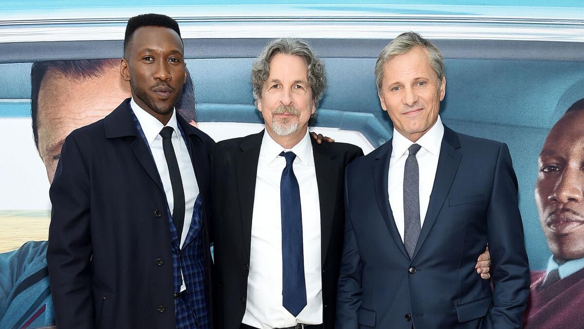 Mahershala Ali, left, writer-director Peter Farrelly and Viggo Mortensen at the "Green Book" New York premiere. The film was nominated for best director, best screenplay and best picture Golden Globes.