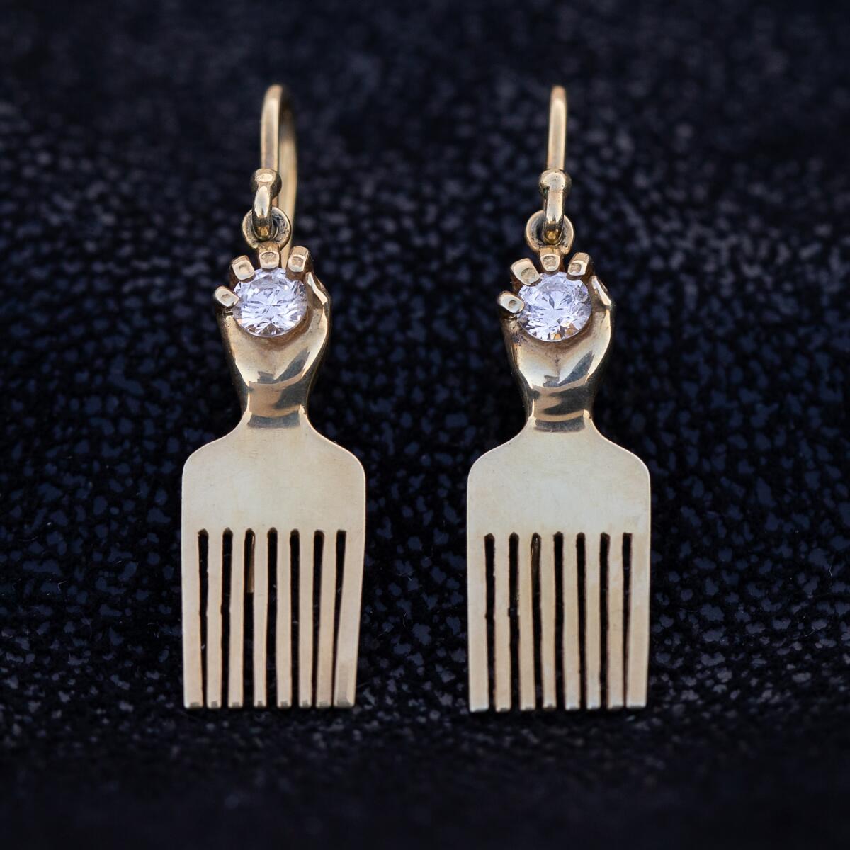 A photo of designer Ericka Franklin's 14-karat gold diamond earrings.