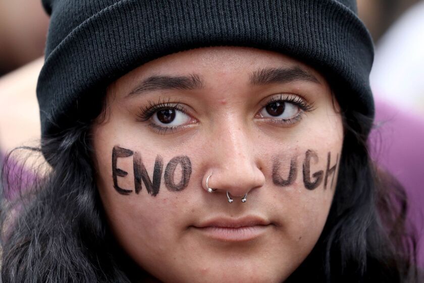 Mandatory Credit: Photo by ANDREW GOMBERT/EPA-EFE/REX/Shutterstock (9475371p) Participants protest in Downtown Los Angles during the March For Our Lives in Los Angeles, California, USA, 24 March 2018. March For Our Lives was organized in response to the 14 February shooting at Marjory Stoneman Douglas High School in Parkland, Florida. The student activists demand that their lives and safety become a priority, and an end to gun violence and mass shootings in schools. March for our Lives Los Angeles, USA - 25 Mar 2018 ** Usable by LA, CT and MoD ONLY **