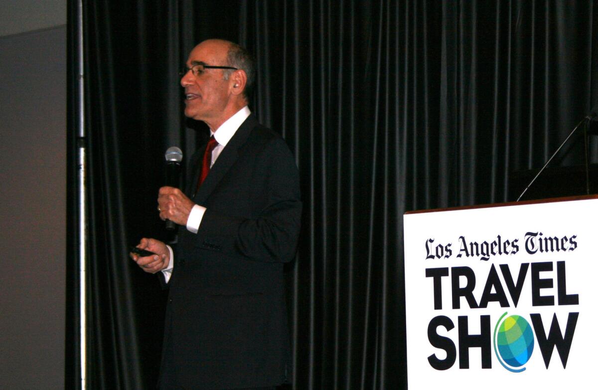 John Severini, the president and chief executive of the California Travel Assn., speaks at the L.A. Times Travel Show at the L.A. Convention Center.