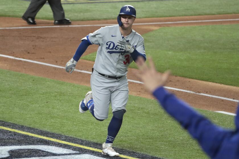 Arlington, Texas, Sunday, October 25, 2020 Los Angeles Dodgers left fielder Joc Pederson (31) homers.