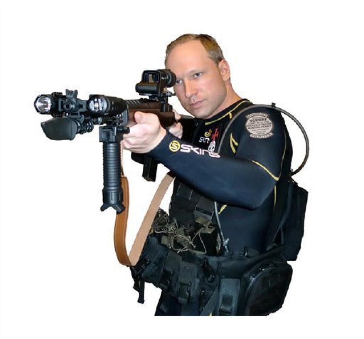 EDS NOTE: IMAGE HAS BEEN DIGITALLY ALTERED BY THE ORIGINAL SOURCE TO REMOVE THE BACKGROUND - This image shows Anders Behring Breivik from a manifesto attributed to him that was discovered Saturday, July 23, 2011. Breivik is a suspect in a bombing in Oslo and a shooting on a nearby island which occurred on Friday, July 22, 2011. The Norwegian news agency NTB said Breivik wrote a 1,500-page manifesto before the attack in which he attacked multiculturalism and Muslim immigration. The document, which contained this and other photos, also described how to acquire explosives. (AP Photo/via Scanpix)