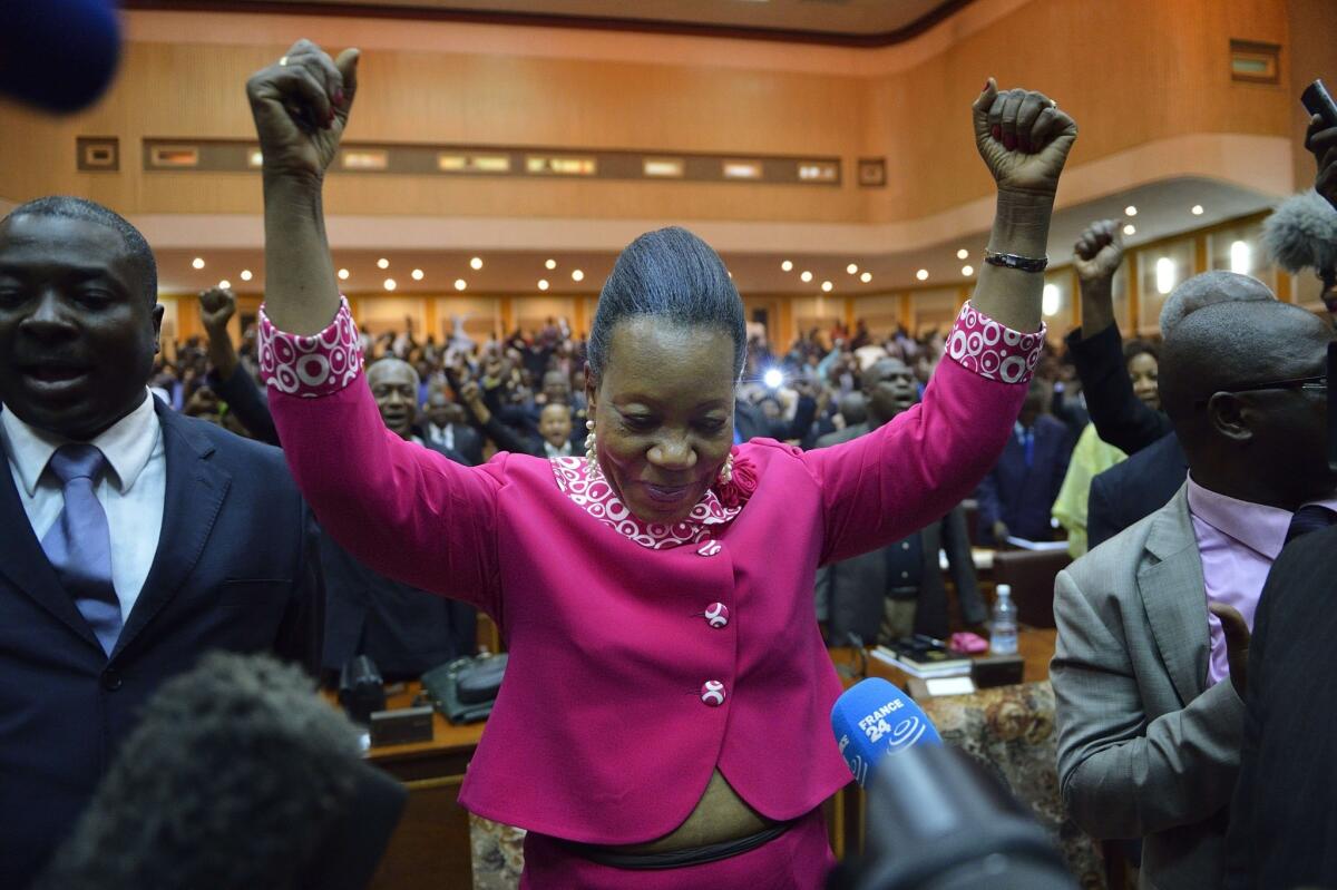 Catherine Samba-Panza celebrates after being elected interim president of the Central African Republic.