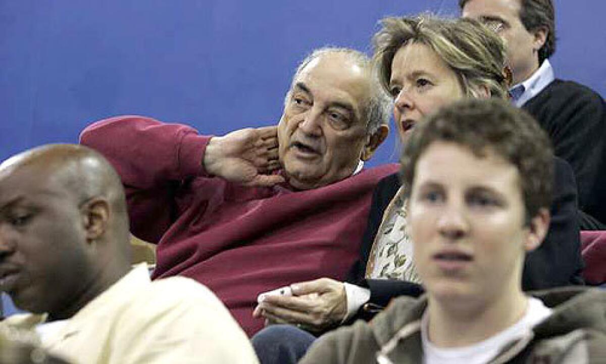 Sonny Vaccaro and his wife, Pam, watch the UCLA-Arizona game