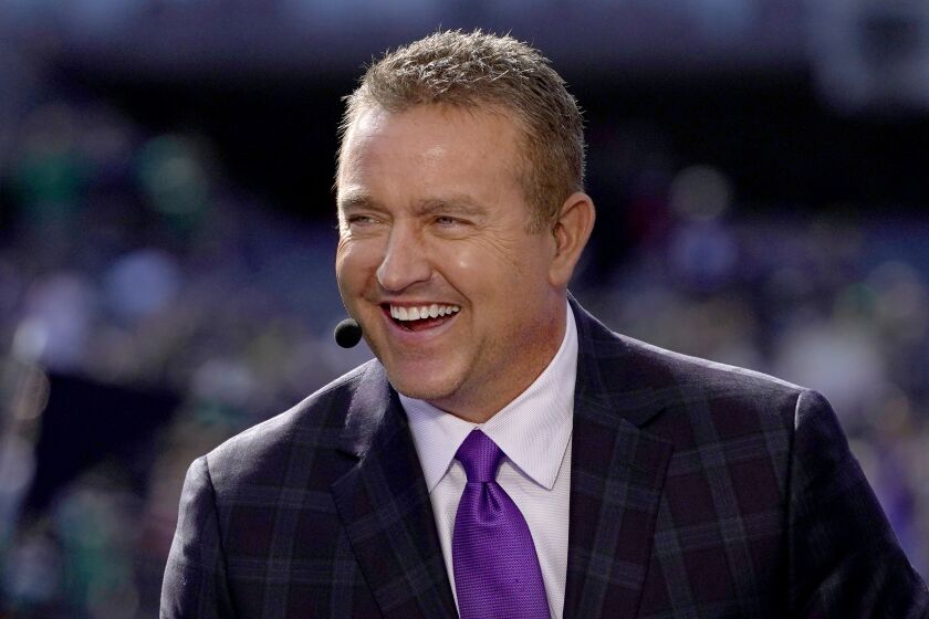 Kirk Herbstreit laughs on the set of ESPN's College Game Day program in Soldier Field.