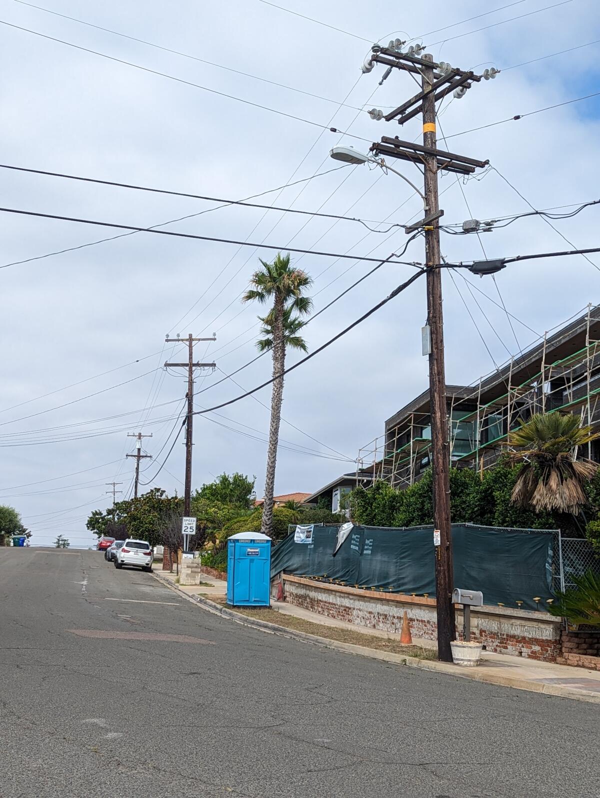 Overhead power lines in La Jolla's Muirlands area near Avenida Chamnez