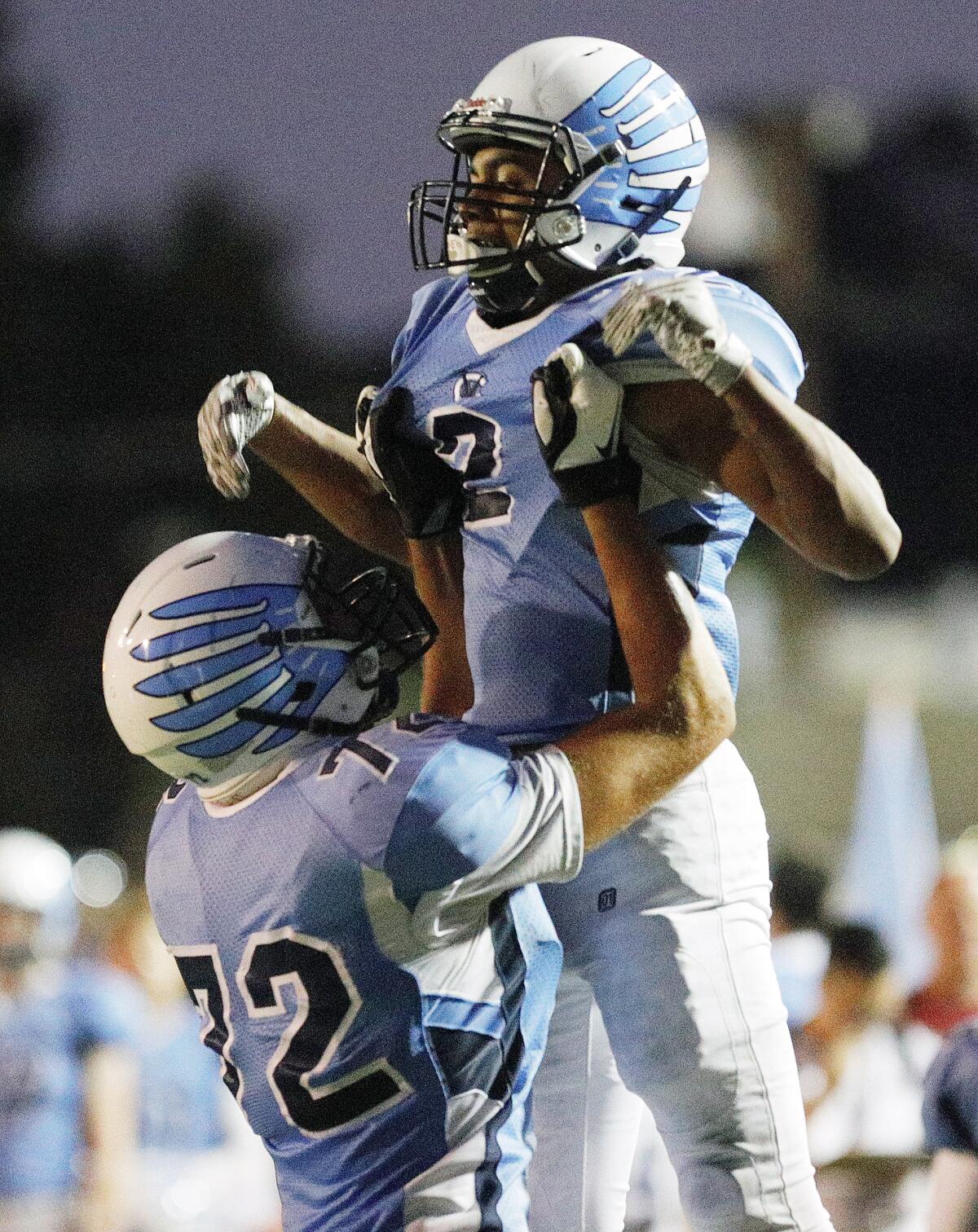 Crescenta Valley High's Maximus Grant, right, and the Falcons will compete against Redondo Union in a nonleague road game at 7 p.m. Friday.