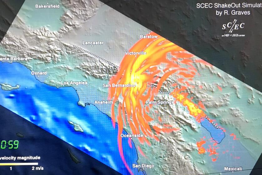 PASADENA, CA -- OCTOBER 17, 2018: An earthquake simulation shows shockwaves radiating outwards. Officials and scientists from Caltech announced the roll-out of ShakeAlert, an early earthquake warning system that can provide valuable seconds of advance warning. The warning can allow surgeons to halt surgery, transportation systems to be halted and utilities to be shut off. (Myung J. Chun / Los Angeles Times)