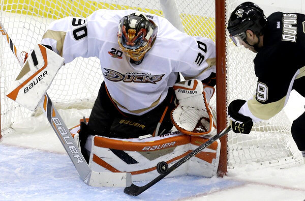Ducks goaltender Viktor Fasth stops a shot by Penguins left wing Pascal Dupuis during a game last week.