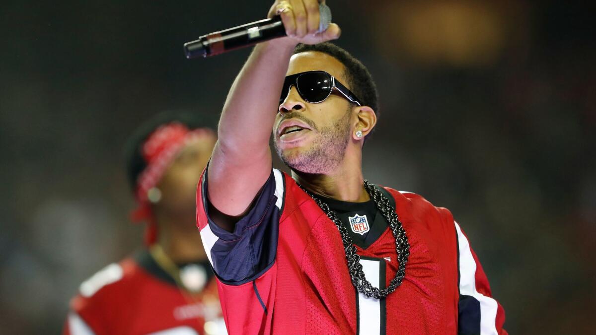 Ludacris performs at halftime during a NFL game earlier this month between the Atlanta Falcons and the Seattle Seahawks.