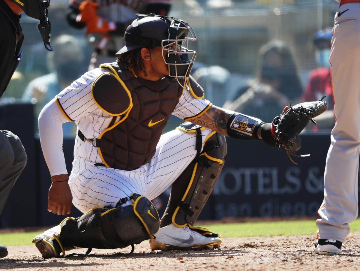 Luis Campusano catches against the San Francisco Giants on April 7.