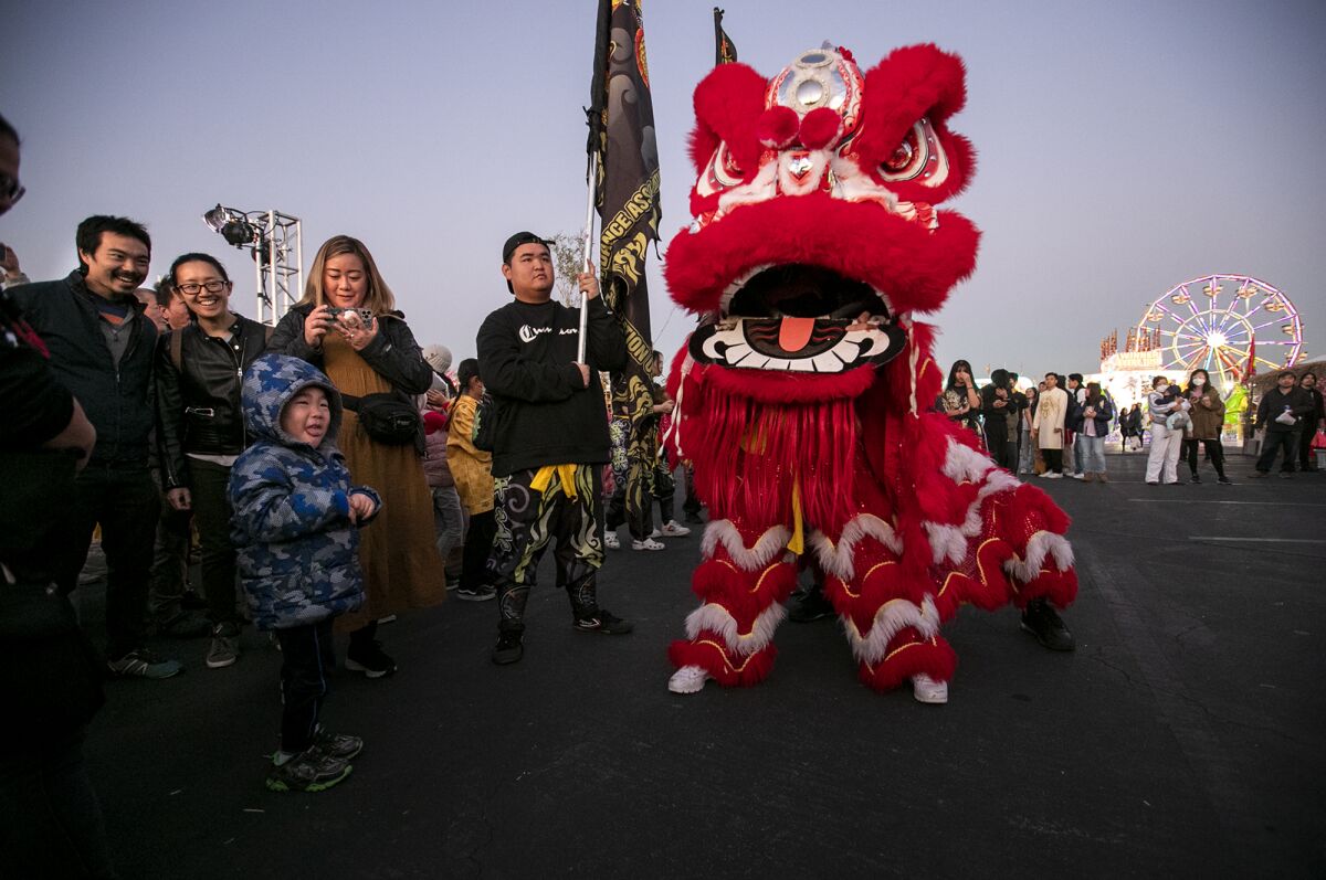 Festivalgoers celebrate at the Tet Festival at the O.C. Fairgrounds on Friday in Costa Mesa.