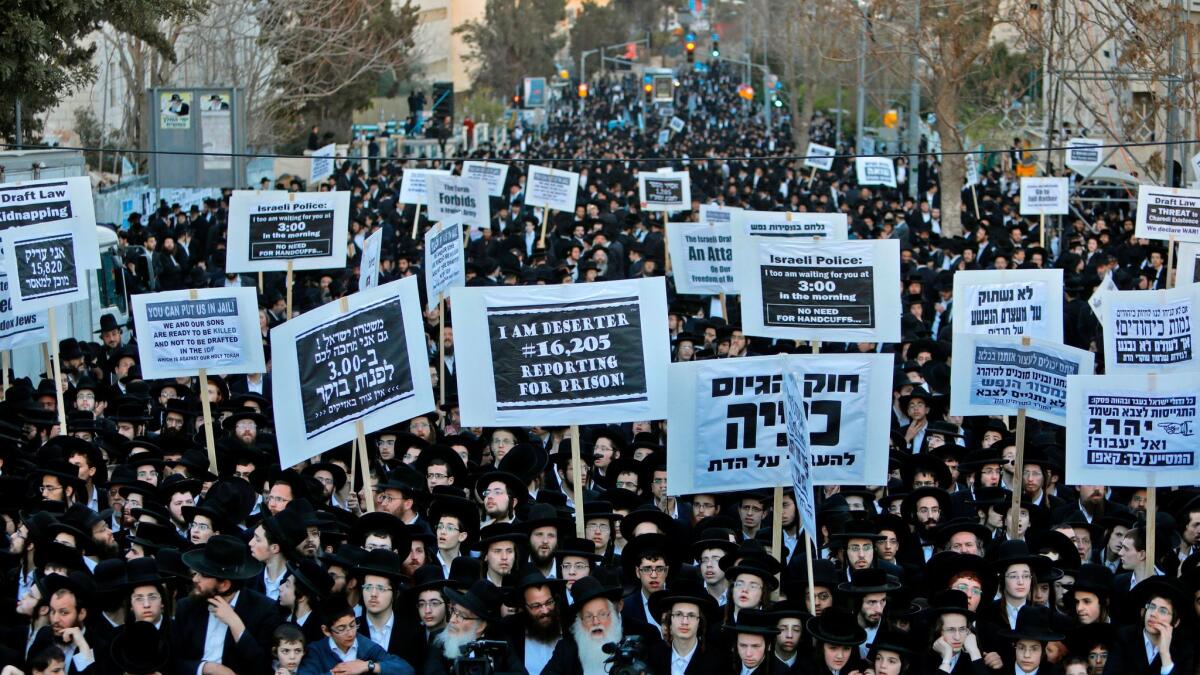 Ultra-Orthodox Jews take part in a March 28, 2017, protest in Jerusalem against Israeli army conscription.