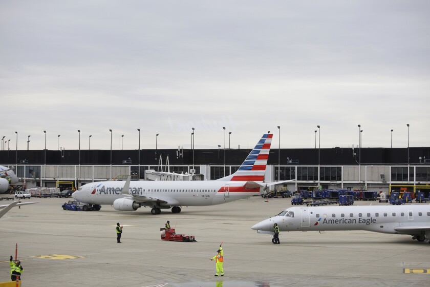 The NAACP has retracted its travel warning against American Airlines, declaring that the airline had made "substantial" progress in addressing concerns of mistreatment of black passengers.