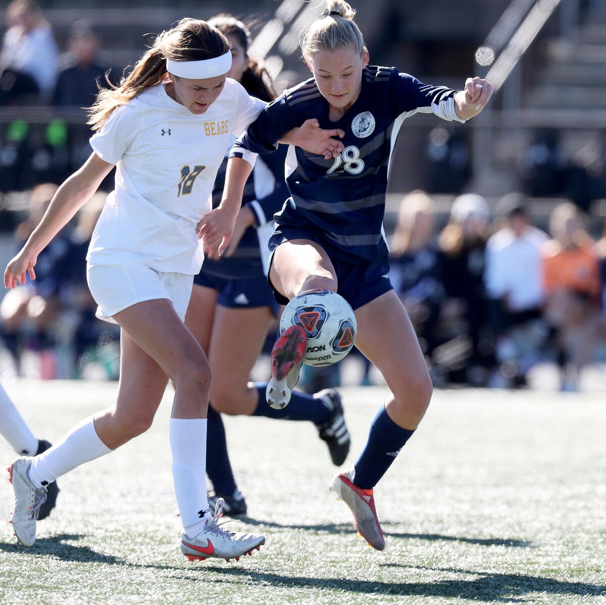 Newport Harbor's Alex Thomas, right, battles Temecula Valley's Kate Jacobsen for a loose ball.
